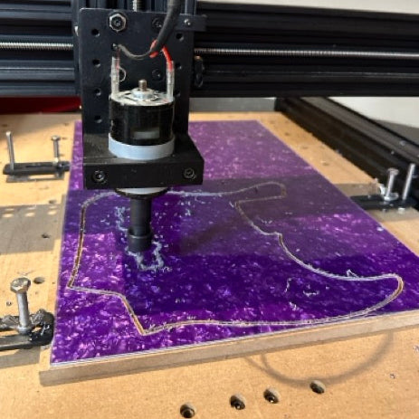 CNC Router with purple pickguard plate